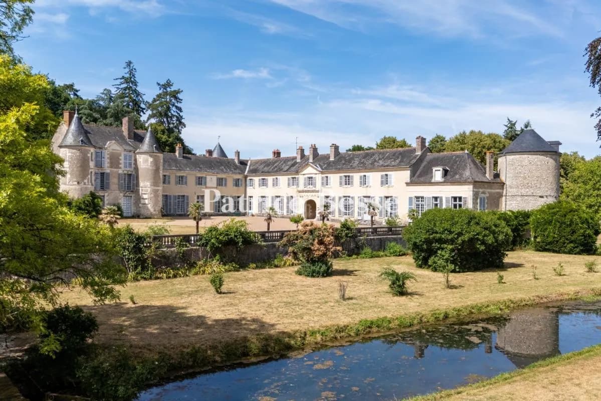 Historic Château With Extensive Grounds And Unique Architectural Features