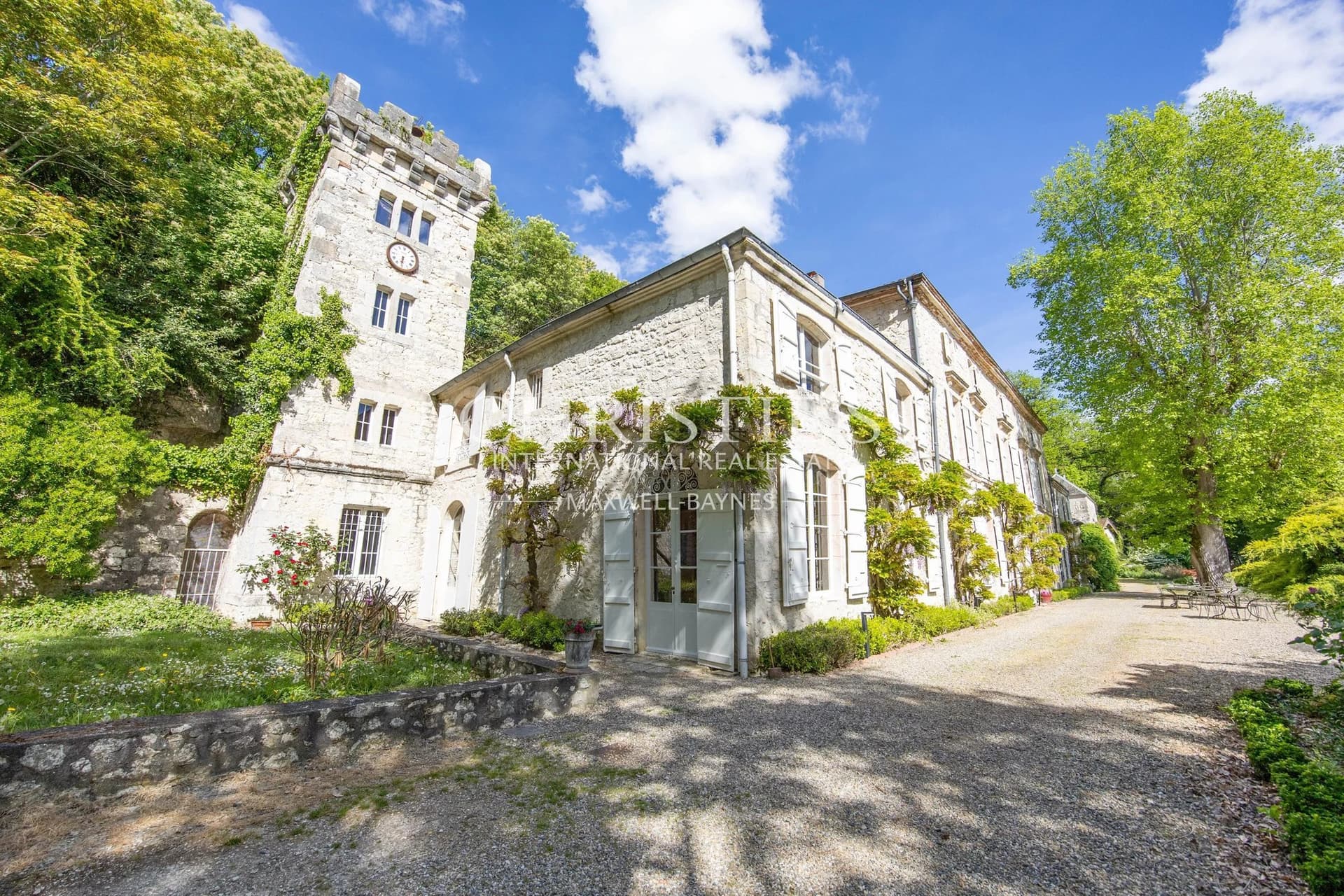 Historic Château With Majestic Towers And Expansive Grounds