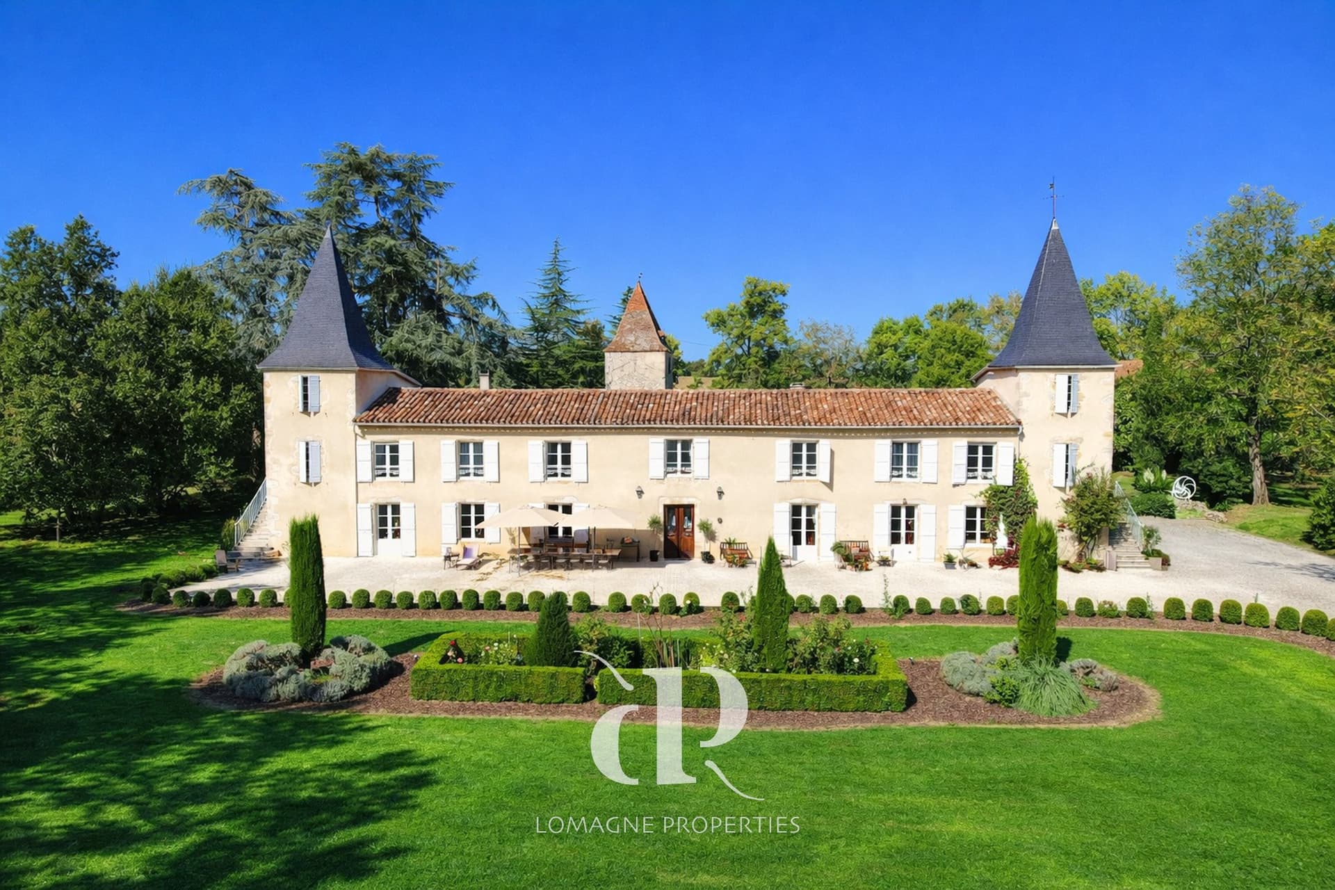 Elegant 18th Century Manor With Towers And Landscaped Grounds