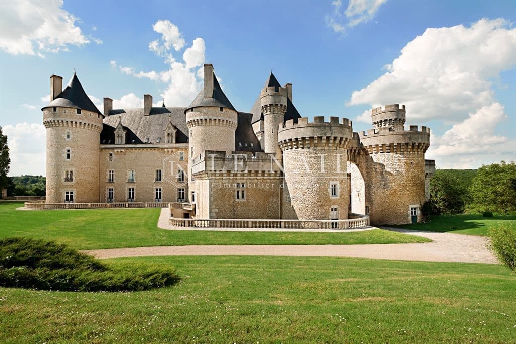 Remarkable 15th Century Castle With Extensive Grounds And 21 Bedrooms — in Indre, France