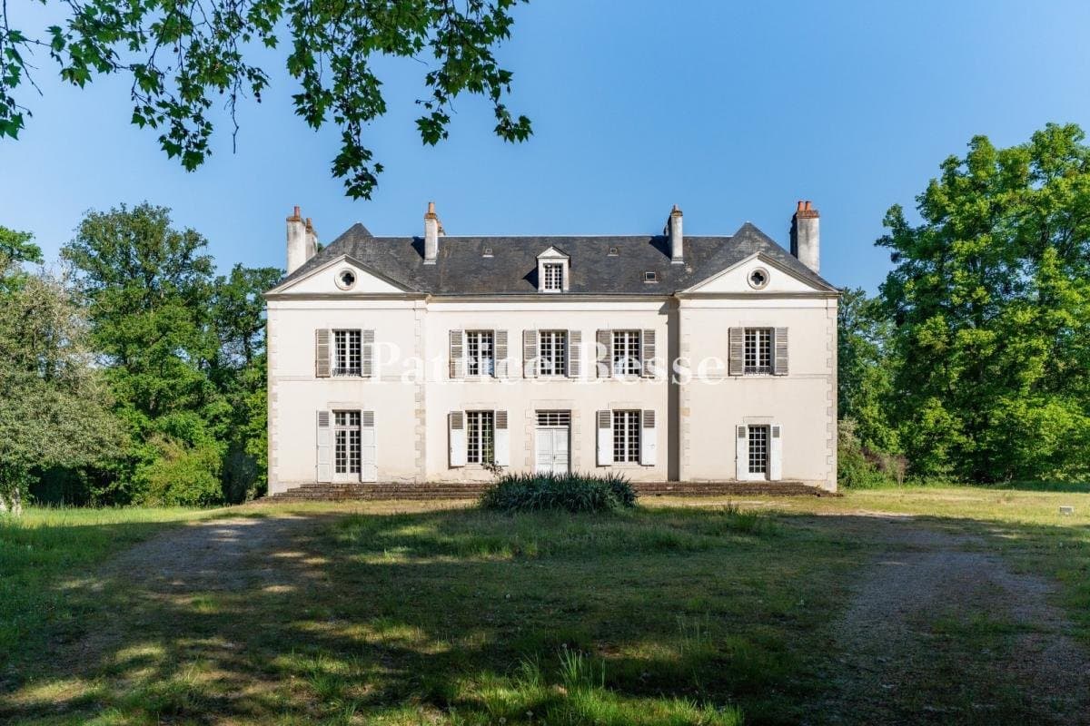 Family Château With Outbuildings And 14 Hectares Of Grounds