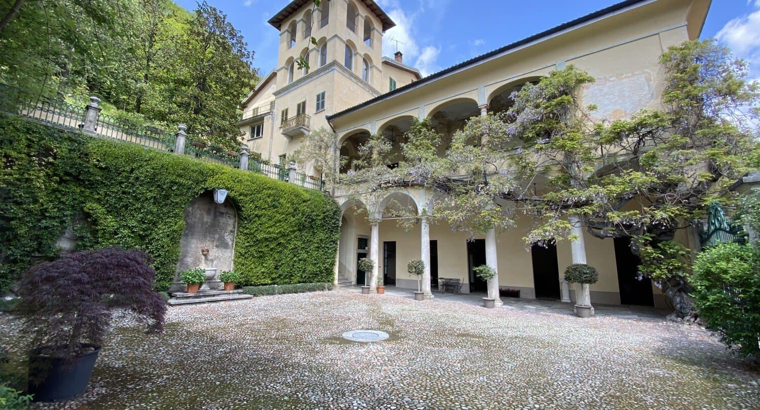 Elegant Historic Palace With Arched Portico And Scenic Hillside Views 4