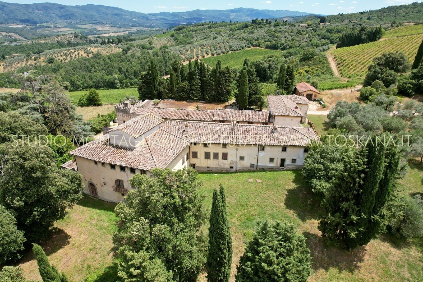 Ancient 12th Century Villa Fattoria With Vineyards And Olive Groves — in Tuscany, Italy