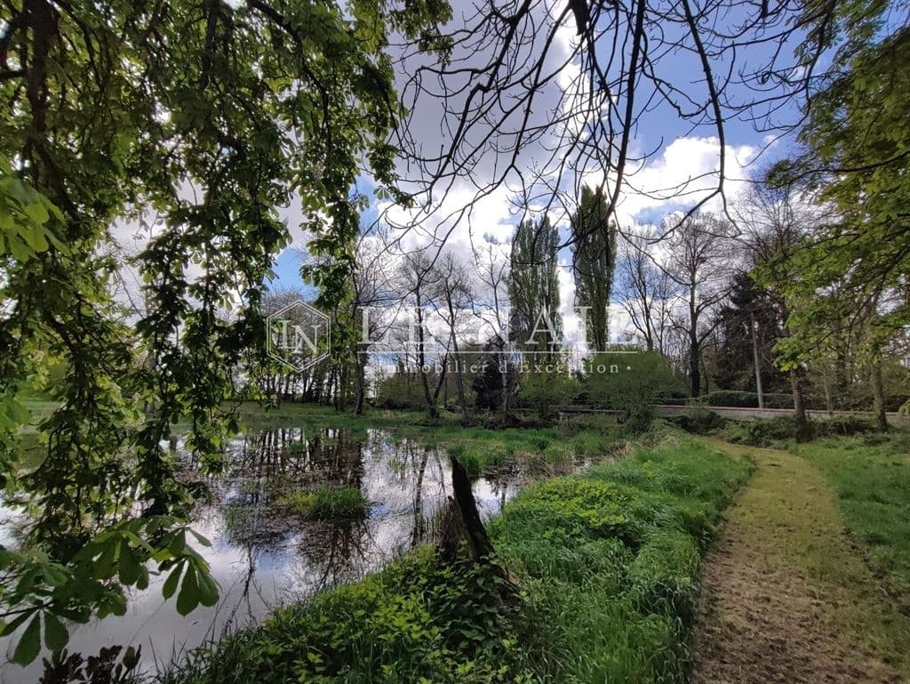 Tranquil Château with Expansive Park and Pond 5