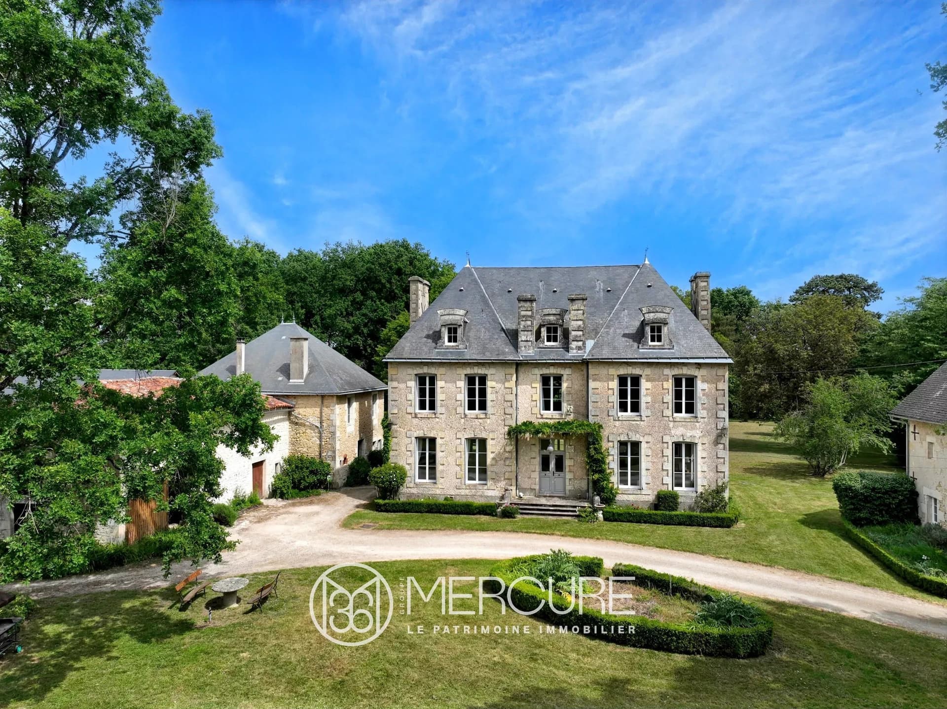 A Charming 19th Century Estate With A Guest House, Outbuildings, A Swimming Pool, And Wooded Grounds