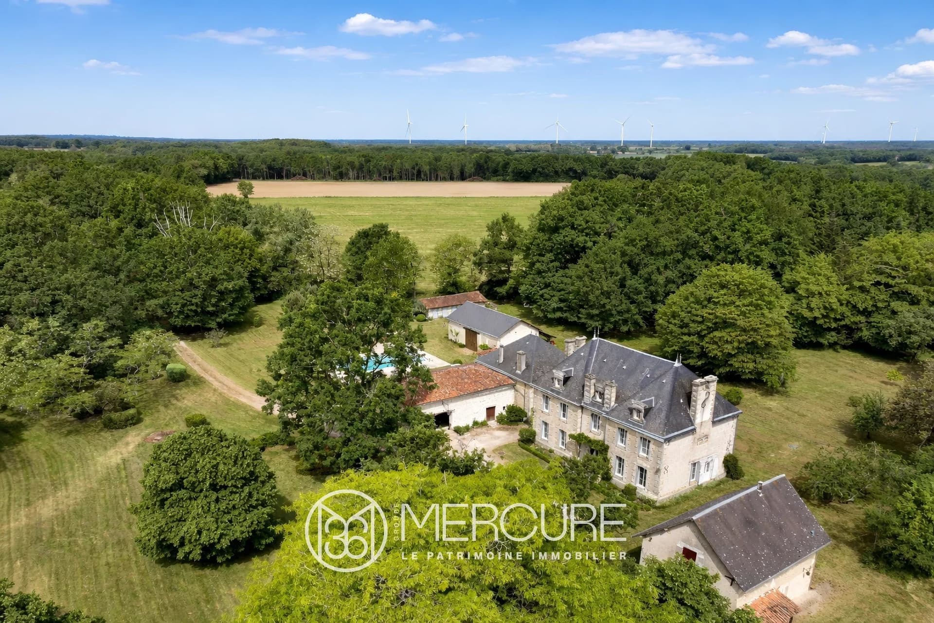 A Charming 19th Century Estate With A Guest House, Outbuildings, A Swimming Pool, And Wooded Grounds 3