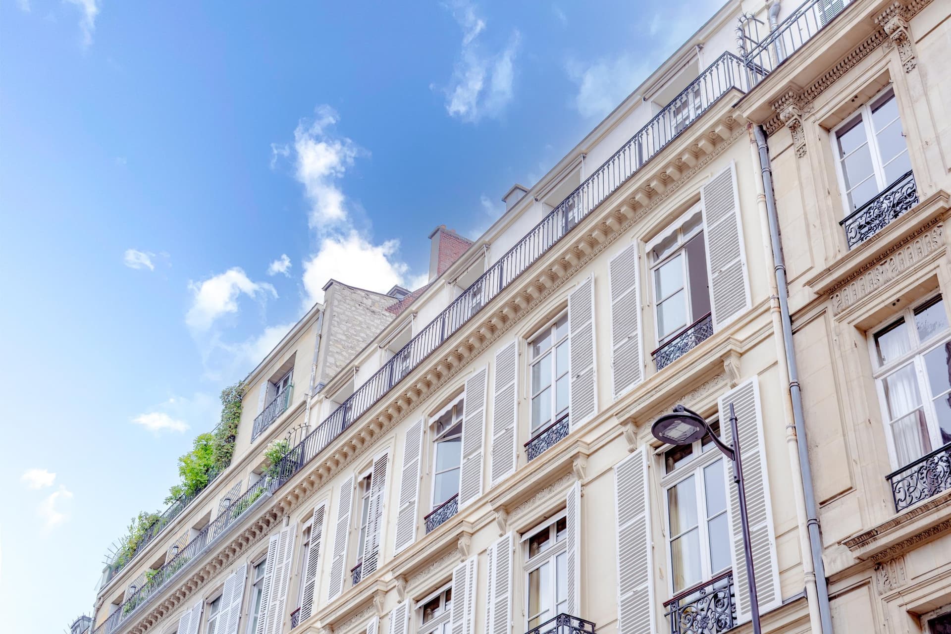 Exceptional Top Floor Apartment with Garden Views in Central Paris — in France