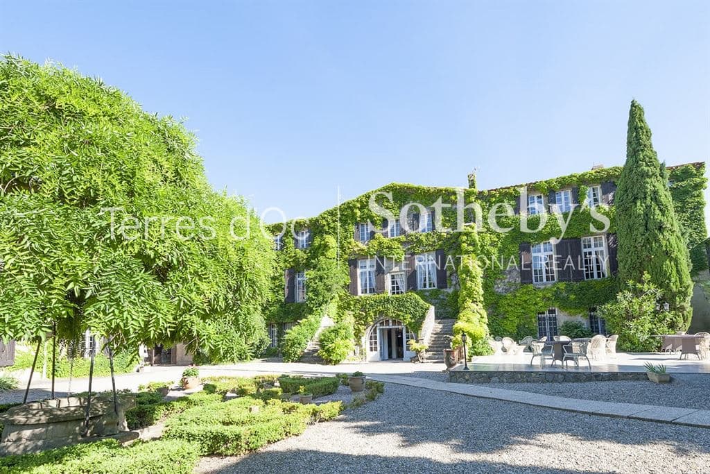 Elegant Château with 27 Bedrooms and Panoramic Mountain Views