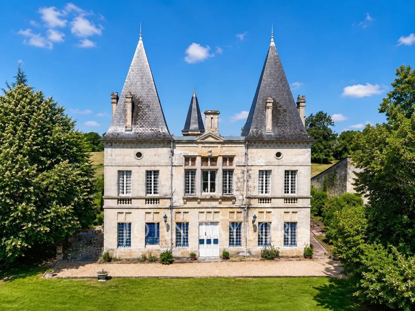 Elegant Château with 900 Sqm Living Space and 23 Hectares Near Bordeaux