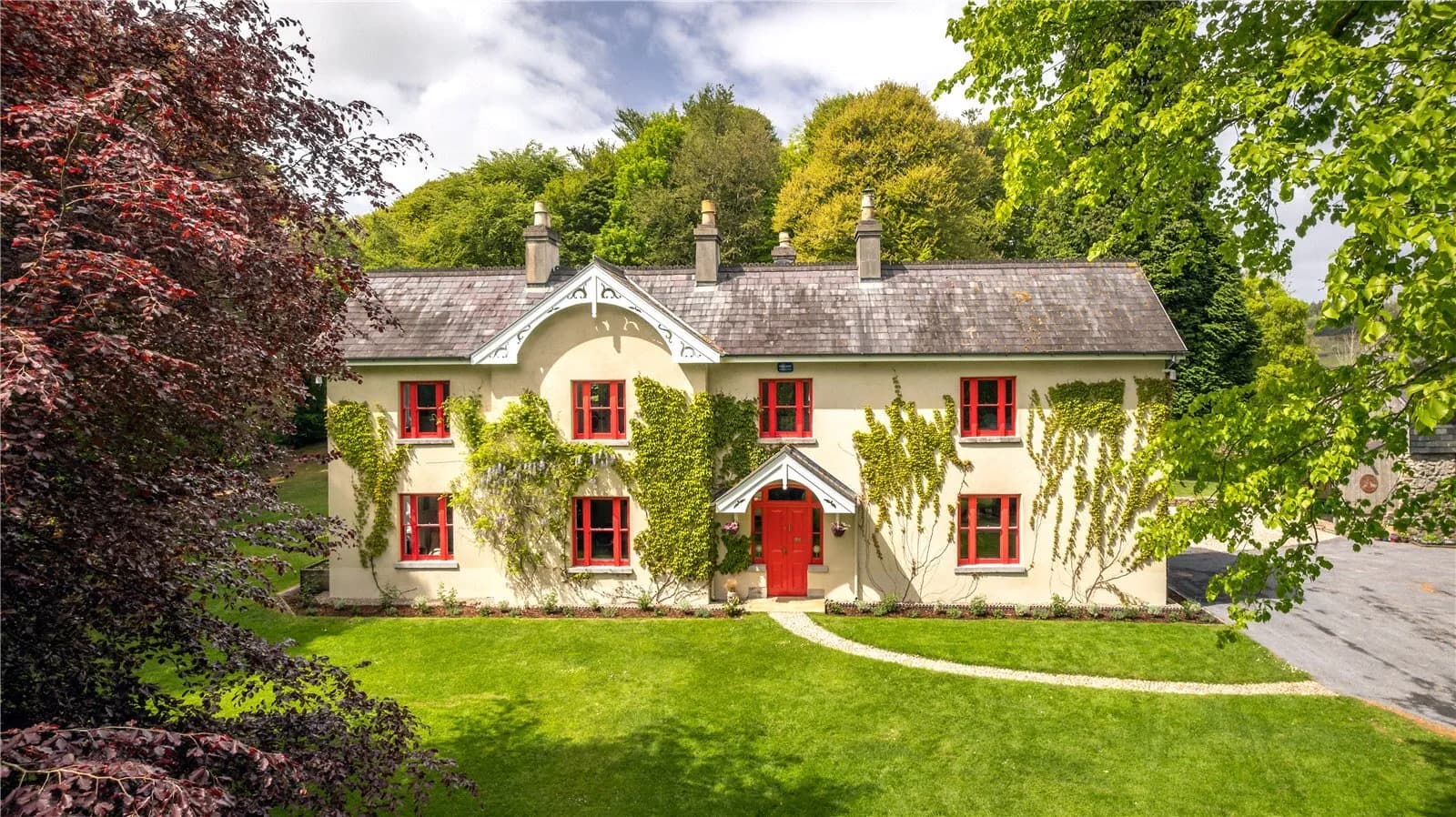 Elegant Restored Manor House with Equestrian Facilities and Lush Gardens