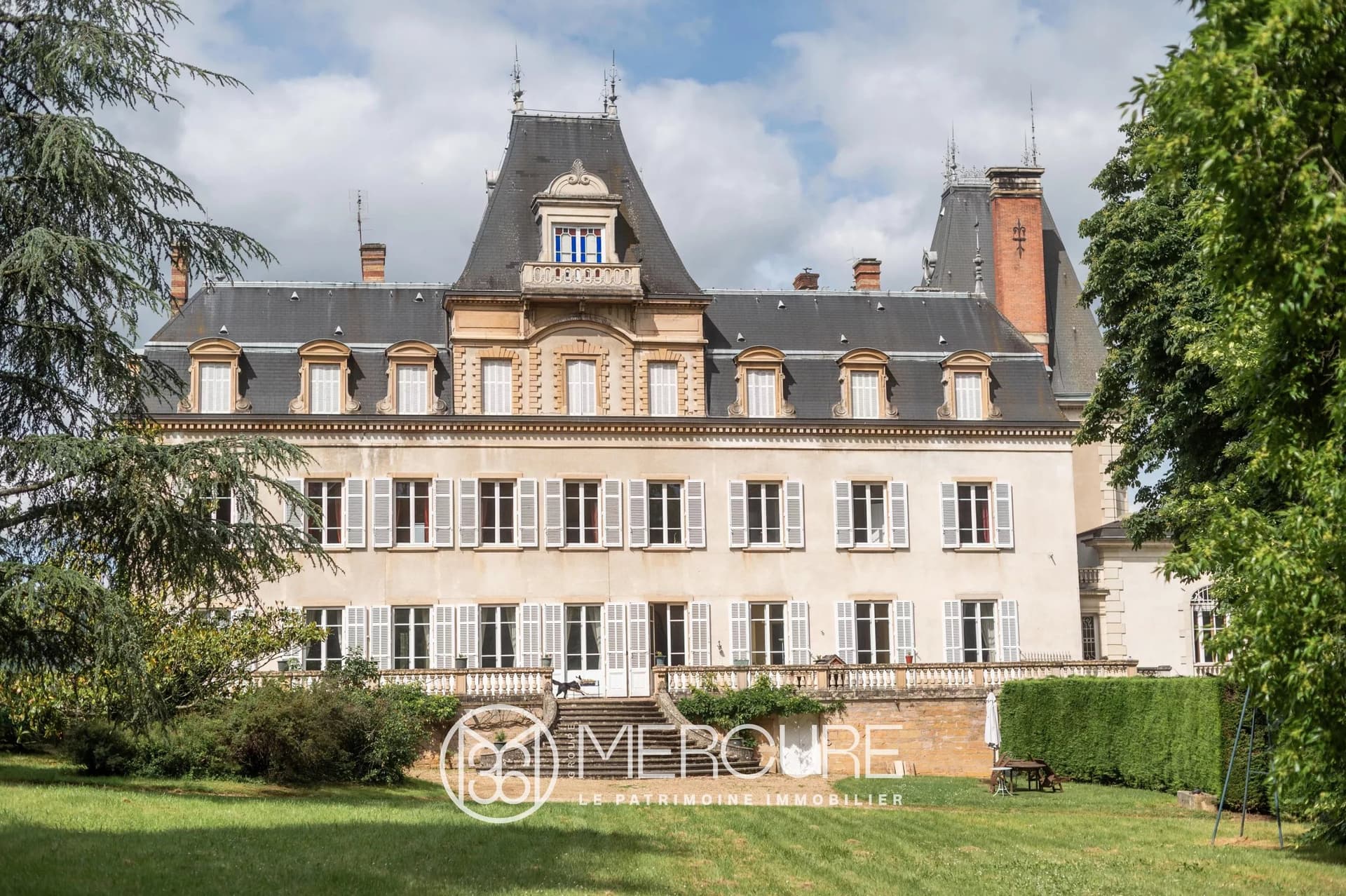 Historic Château Surrounded By Vineyards With Former Wine Press Building