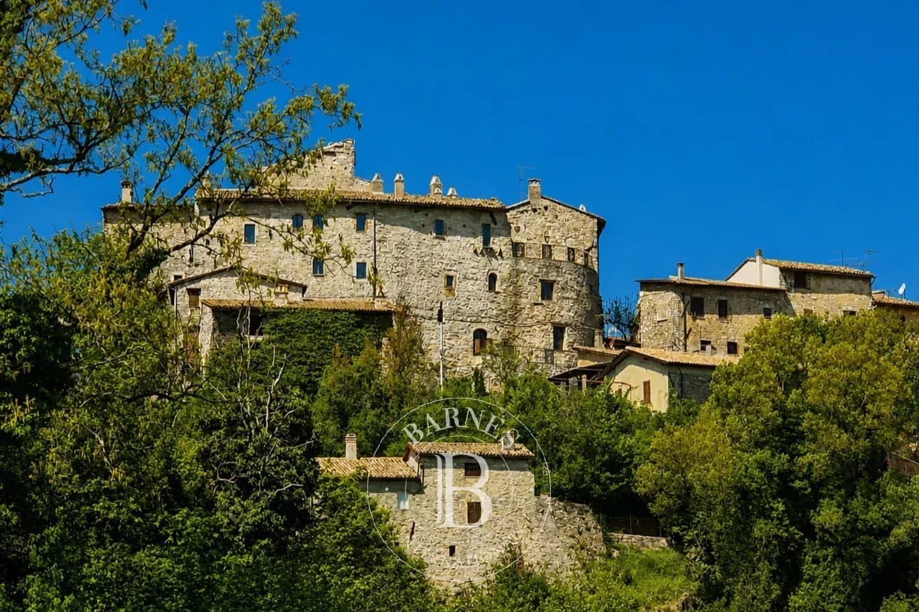 Historic Castle With Eight Suites In The Umbrian Hills — in Umbria, Italy