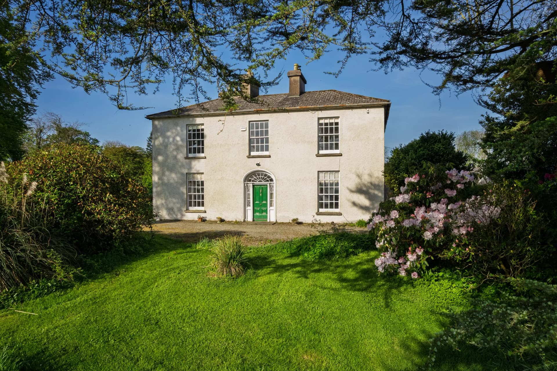 Elegant Georgian Residence with Equestrian Facilities and 15 Acres of Grounds