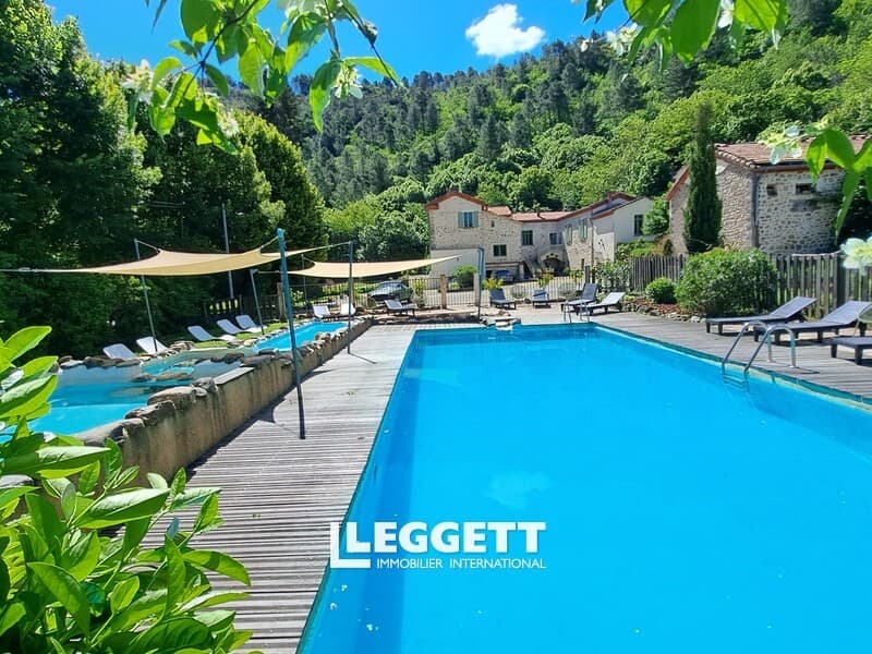 Historic Riverside Castle Near Cévennes National Park