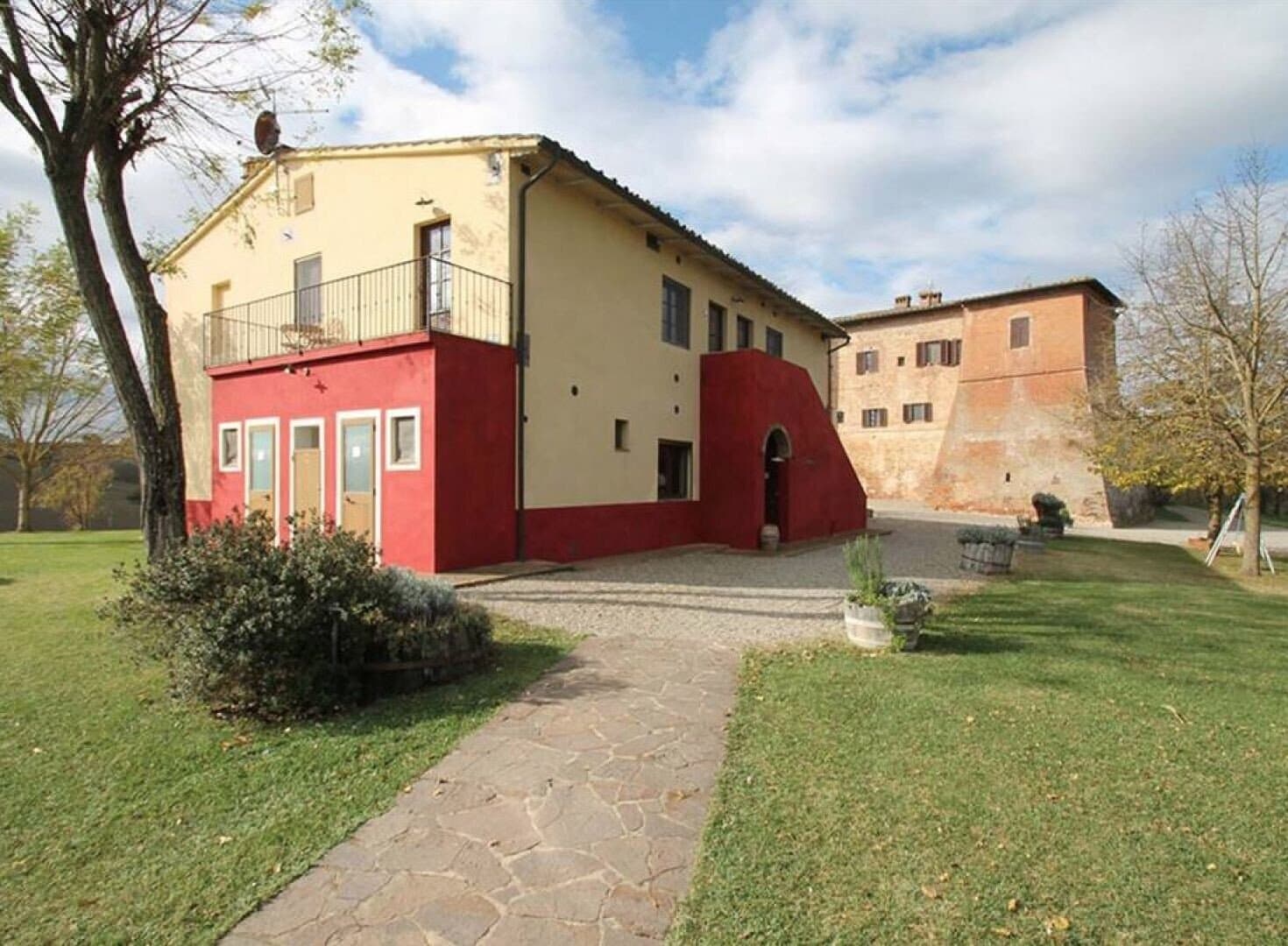 Historic Medieval Complex With Resort, Restaurant, And Pool Overlooking Val d’Arbia — in Tuscany, Italy