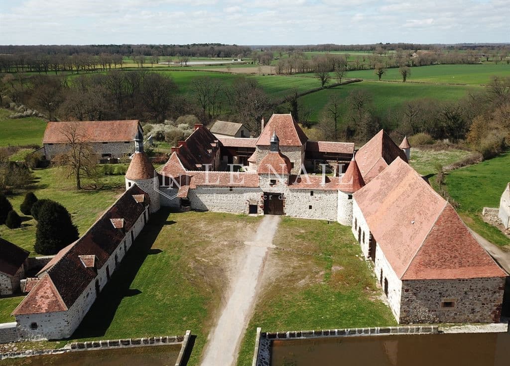 Charming Fortified Farm With Stables And Pond — in Auvergne, France